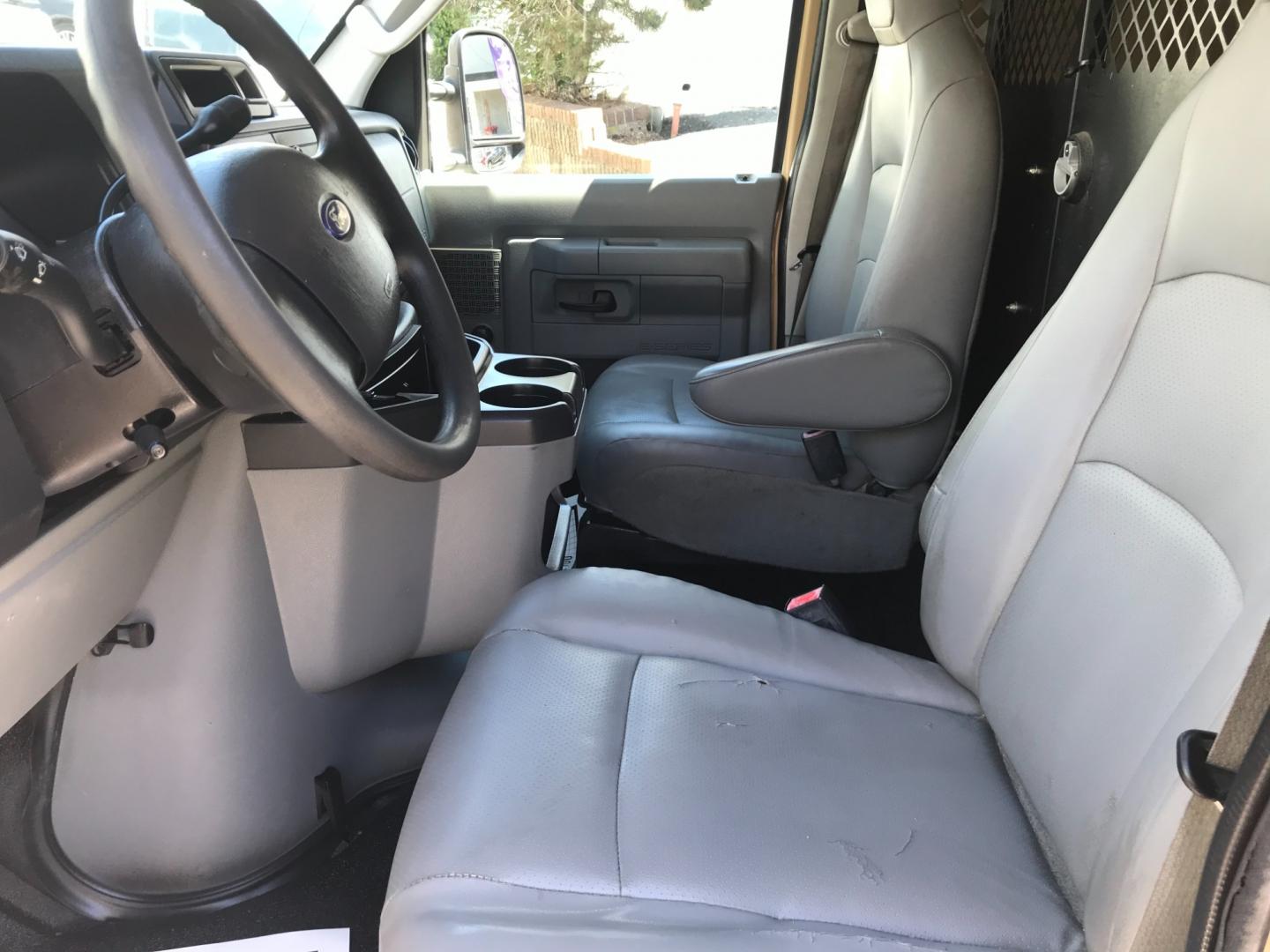 2011 Tan /Gray Ford E-Series Van E250 (1FTNE2EW5BD) with an 4.8 V8 engine, Automatic transmission, located at 577 Chester Pike, Prospect Park, PA, 19076, (610) 237-1015, 39.886154, -75.302338 - 2011 Ford E250 Cargo Van: Ladder racks, shelving, heavy duty partition, power inverter, fully metal body, FLEET MAINTAINED, runs LIKE NEW! This vehicle comes inspected and has been given a bumper to bumper safety check. It is very clean, reliable, and well maintained. We offer a unique pay plan t - Photo#9